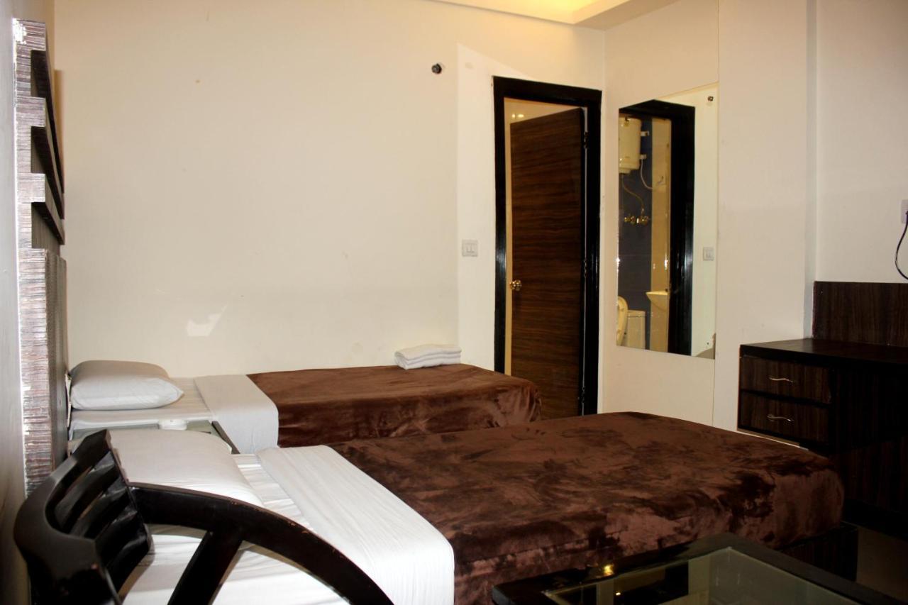 Aman Deluxe Hotel New Delhi Buitenkant foto